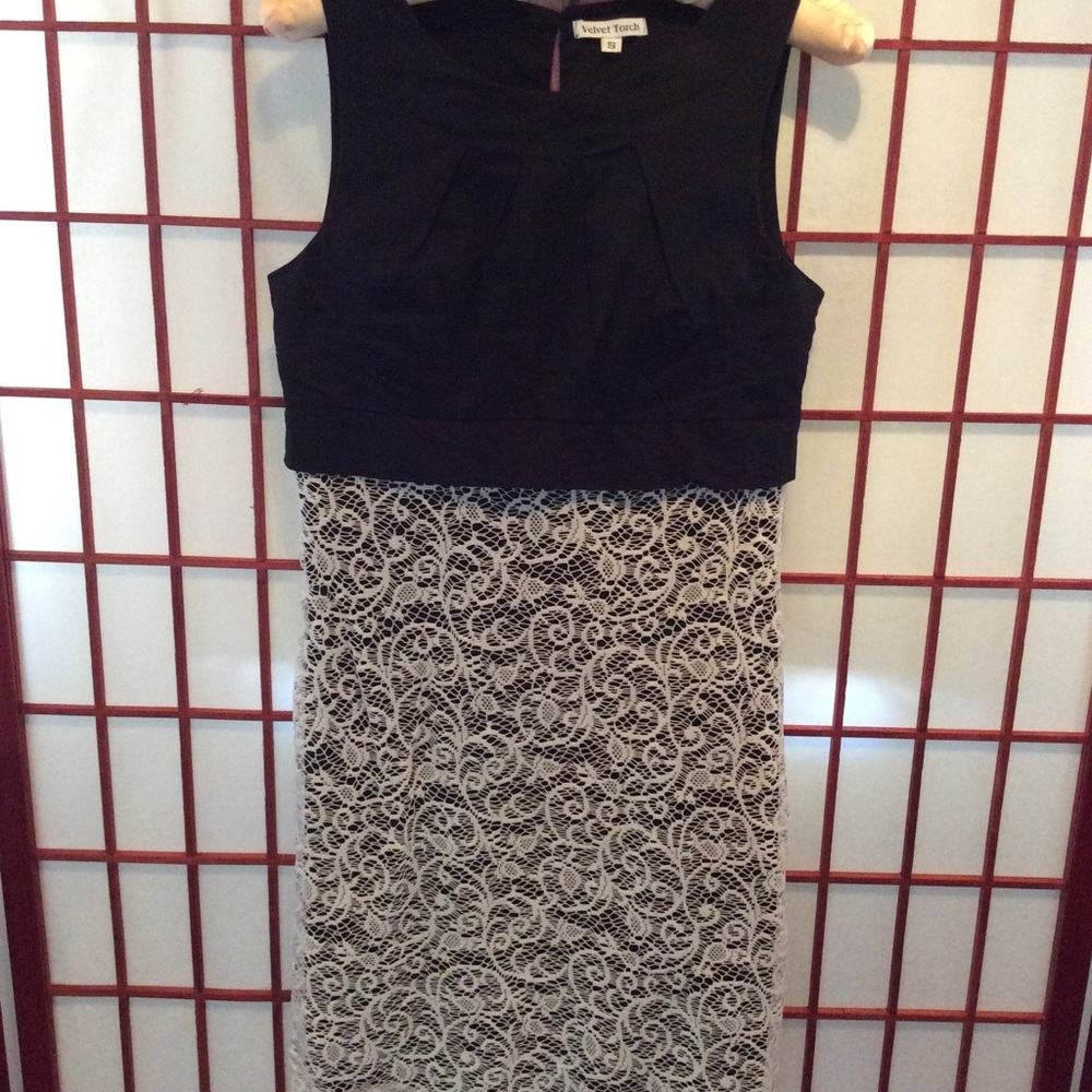 Fancy sleeveless black with white lace mini dress